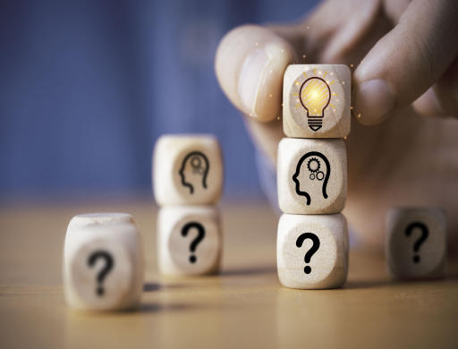 hand-putting-wooden-cube-block-stacking-which-print-screen-glowing-light-bulb-question-mark-with-human-creative-thinking-idea-problem-solving-concept.jpg